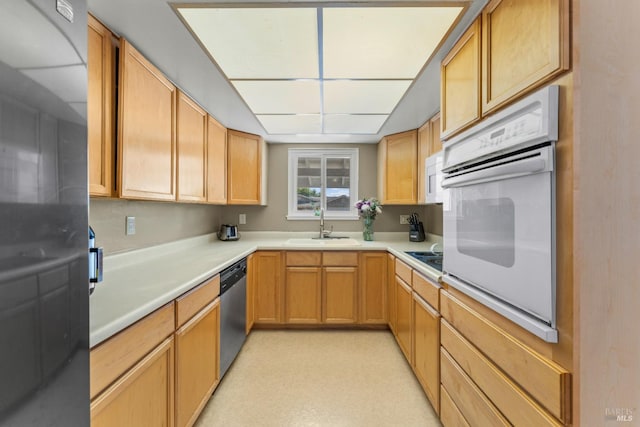 2235 Nottingham Dr, Fairfield, CA 94534 - kitchen with white appliances, a sink, light countertops, and light brown cabinetry