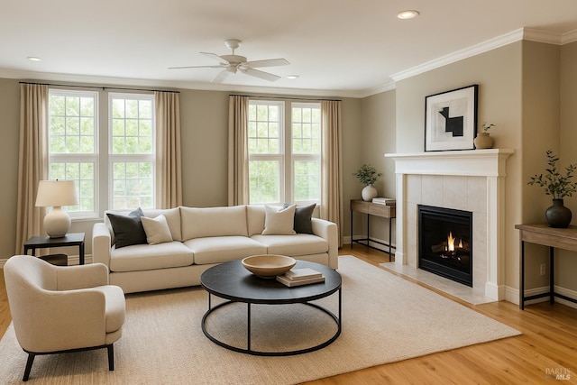 764 Mcclelland Dr, Windsor, CA 95492 - living room featuring crown molding, wood finished floors, a fireplace, ceiling fan, and recessed lighting