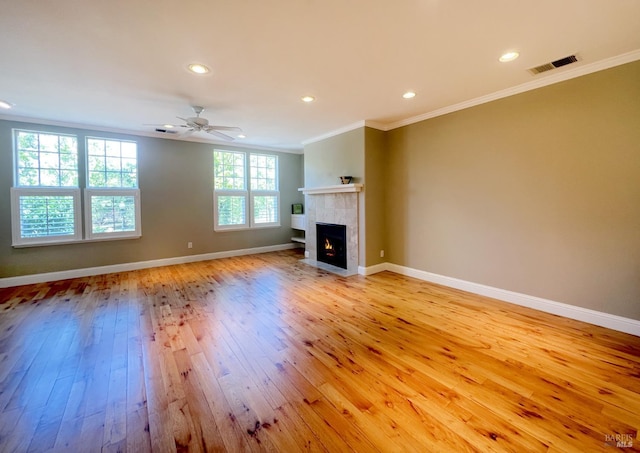764 Mcclelland Dr, Windsor, CA 95492 - unfurnished living room featuring light wood finished floors, ornamental molding, a fireplace, recessed lighting, and a ceiling fan
