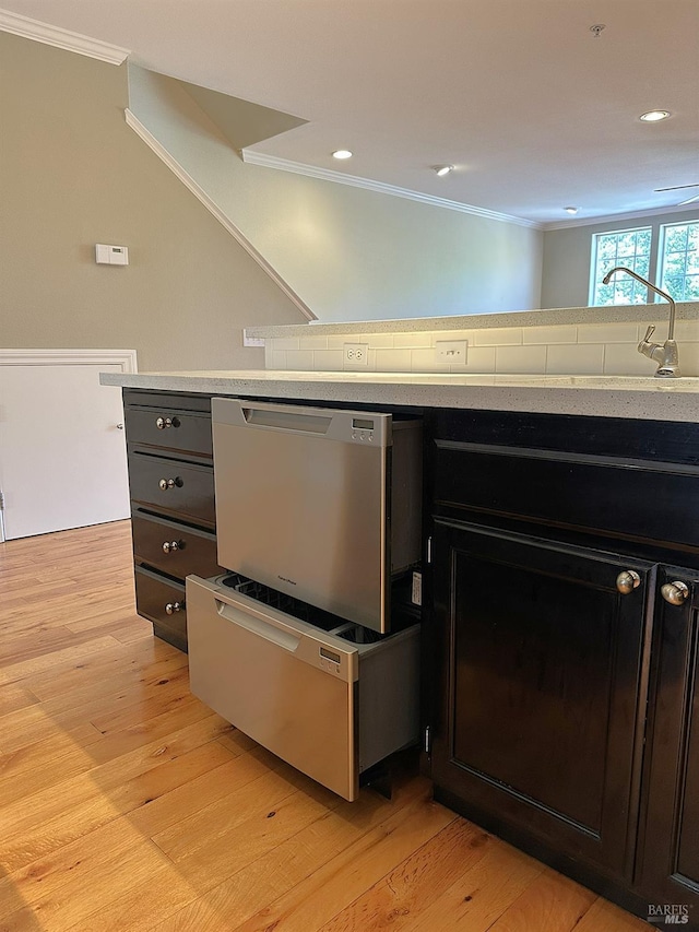 764 Mcclelland Dr, Windsor, CA 95492 - kitchen with crown molding, light wood-style floors, light countertops, recessed lighting, and stainless steel dishwasher