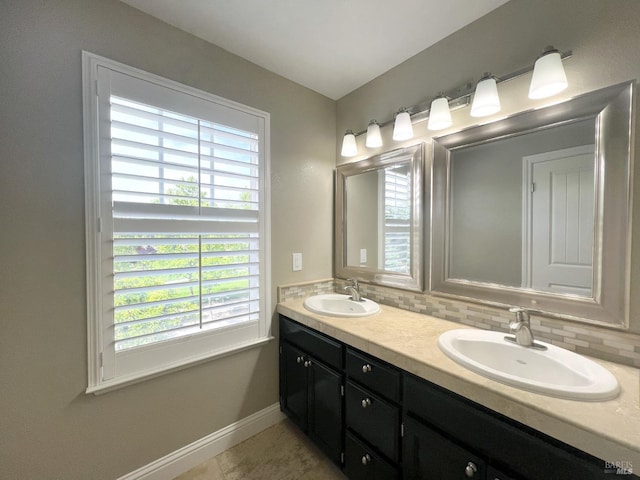 764 Mcclelland Dr, Windsor, CA 95492 - bathroom featuring healthy amount of natural light, double vanity, baseboards, and decorative backsplash
