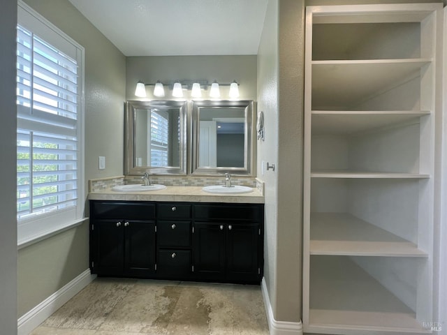 764 Mcclelland Dr, Windsor, CA 95492 - bathroom featuring double vanity and baseboards