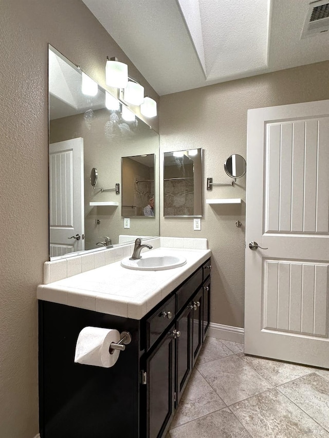 764 Mcclelland Dr, Windsor, CA 95492 - bathroom featuring vanity, tile patterned flooring, and baseboards