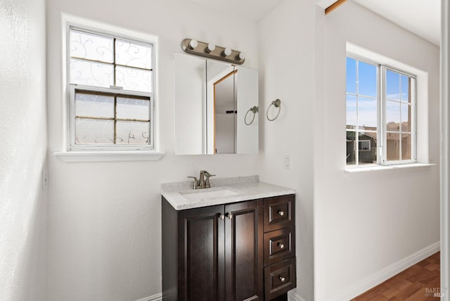 1039 Aston Cir, Santa Rosa, CA 95404 - bathroom featuring baseboards, vanity, and wood finished floors