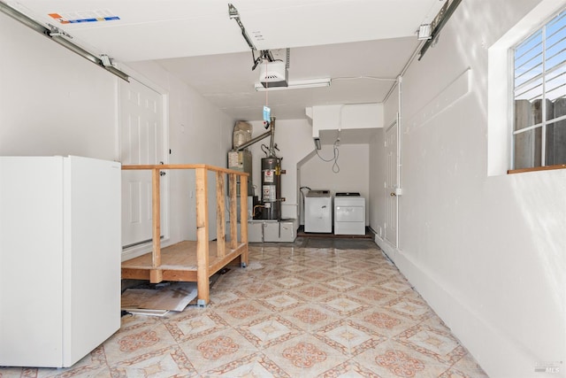 1039 Aston Cir, Santa Rosa, CA 95404 - garage featuring freestanding refrigerator, washer and dryer, a garage door opener, and water heater