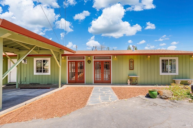 5851 Vine Hill Rd, Sebastopol, CA 95472 - view of front of house featuring french doors and board and batten siding