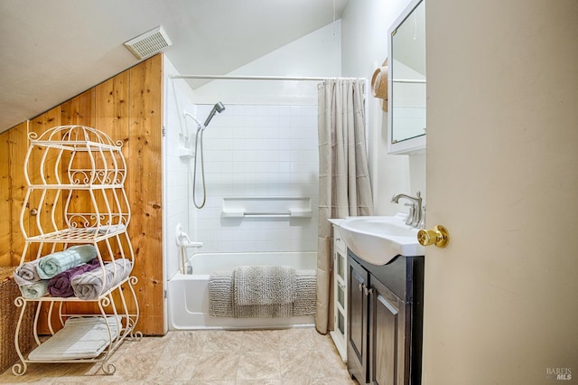 5851 Vine Hill Rd, Sebastopol, CA 95472 - bathroom featuring vaulted ceiling, vanity, and shower / tub combo