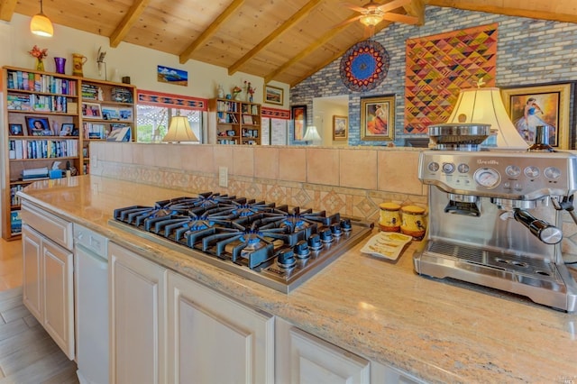 5010 Sleepy Hollow Ln, Fairfield, CA 94534 - kitchen with stainless steel gas cooktop, wood ceiling, ceiling fan, light stone countertops, and white cabinets