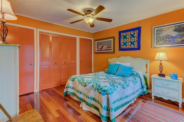 5010 Sleepy Hollow Ln, Fairfield, CA 94534 - bedroom with a closet, wood finished floors, ceiling fan, and crown molding
