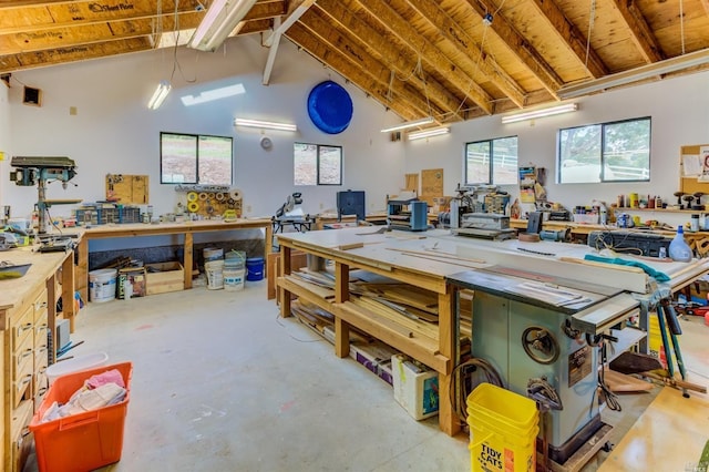 5010 Sleepy Hollow Ln, Fairfield, CA 94534 - misc room featuring a workshop area, high vaulted ceiling, concrete floors, and beam ceiling