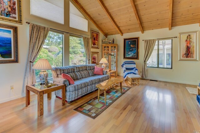 5010 Sleepy Hollow Ln, Fairfield, CA 94534 - living room featuring wood ceiling with exposed beams, light wood finished floors, baseboards, and high vaulted ceiling