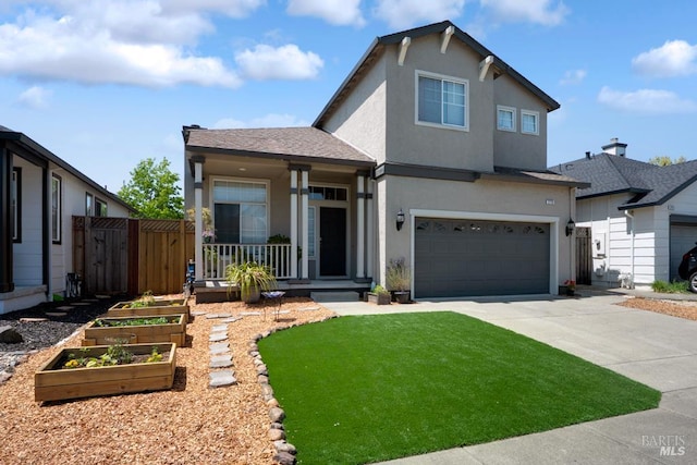 2775 Red Tail St, Santa Rosa, CA 95407 - view of front facade with a vegetable garden, concrete driveway, a garage, a porch, and stucco siding