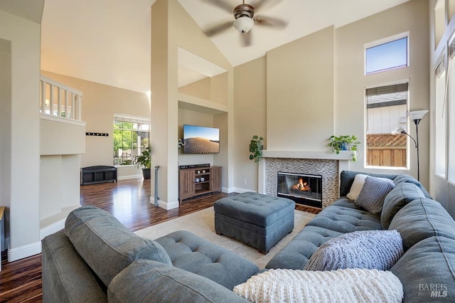 2775 Red Tail St, Santa Rosa, CA 95407 - living area featuring high vaulted ceiling, dark wood-style flooring, a fireplace, ceiling fan, and baseboards