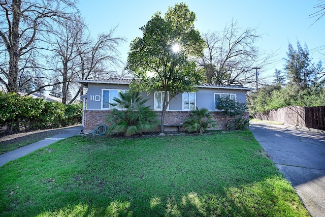 110 Ruth Ct, Sacramento, CA 95819 - view of front facade featuring brick siding, driveway, and stucco siding