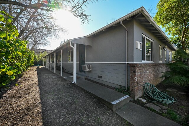 110 Ruth Ct, Sacramento, CA 95819 - view of home's exterior with brick siding, cooling unit, and stucco siding