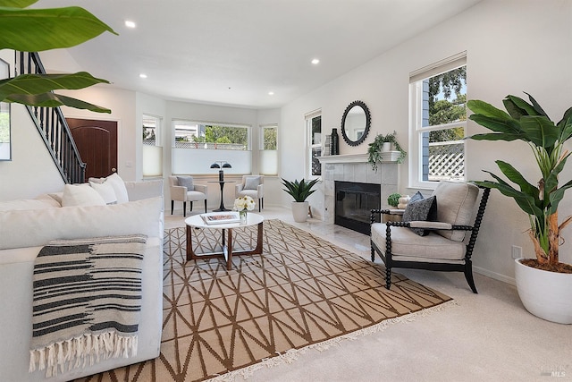1 Courtney Ln, Mill Valley, CA 94941 - living area featuring a tiled fireplace, healthy amount of natural light, recessed lighting, stairway, and carpet