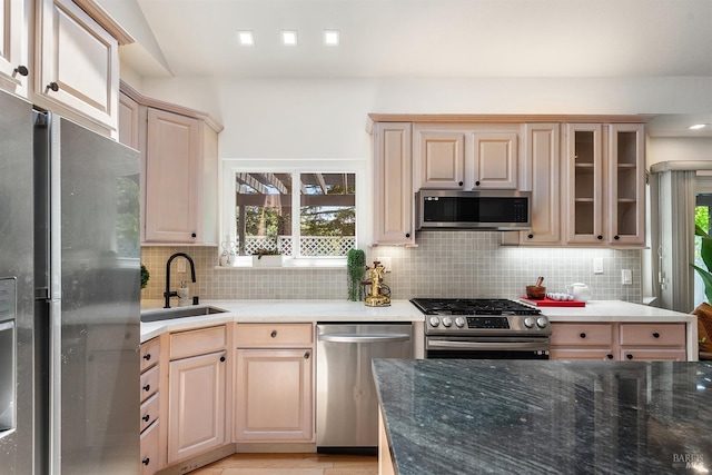 1 Courtney Ln, Mill Valley, CA 94941 - kitchen with stainless steel appliances, a sink, light brown cabinets, backsplash, and healthy amount of natural light