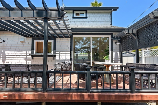 1 Courtney Ln, Mill Valley, CA 94941 - back of property with a wooden deck, a pergola, and outdoor dining area
