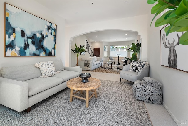 1 Courtney Ln, Mill Valley, CA 94941 - carpeted living room with arched walkways, stairs, recessed lighting, and baseboards