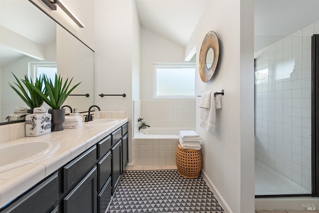 1 Courtney Ln, Mill Valley, CA 94941 - bathroom with lofted ceiling, healthy amount of natural light, a garden tub, double vanity, and a tile shower