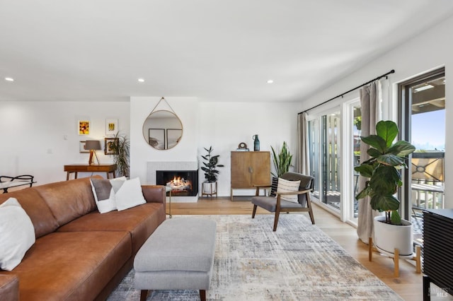 78 Marinero Cir, Tiburon, CA 94920 - living area featuring a lit fireplace, recessed lighting, and light wood-type flooring