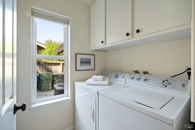 1263 Simmons Ln, Novato, CA 94945 - washroom featuring washer and dryer, cabinet space, and baseboards