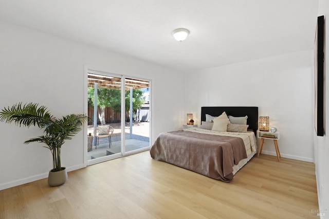 1401 Mcminn Ave, Santa Rosa, CA 95407 - bedroom featuring light wood finished floors, access to outside, and baseboards