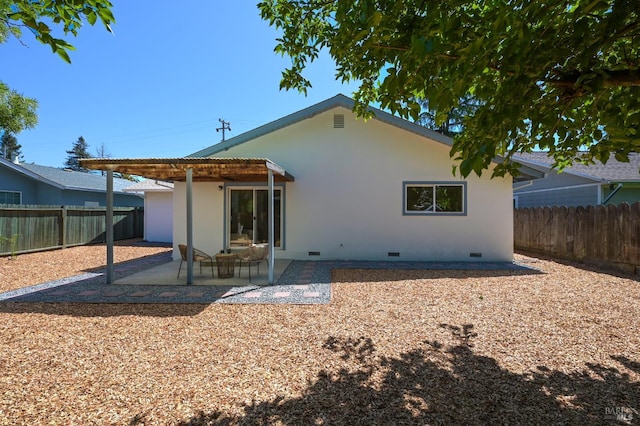1401 Mcminn Ave, Santa Rosa, CA 95407 - rear view of property with crawl space, stucco siding, a fenced backyard, and a patio