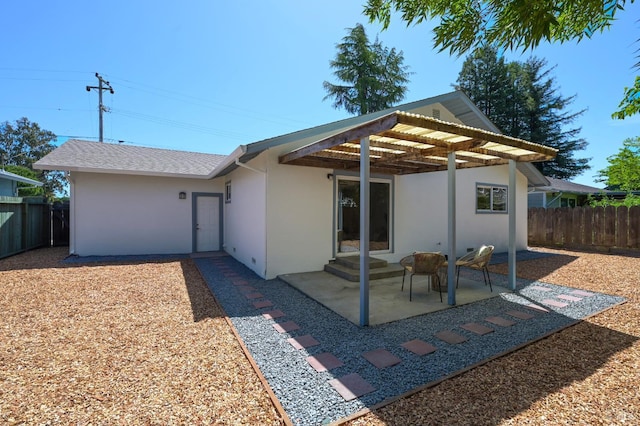 1401 Mcminn Ave, Santa Rosa, CA 95407 - back of house with stucco siding and a patio