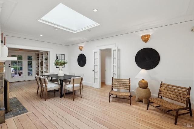 25 Winship Ave, Ross, CA 94957 - dining room featuring a skylight, light wood finished floors, recessed lighting, and baseboards