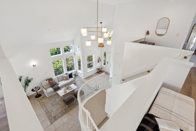 806 Paxton Villa Ct, Novato, CA 94947 - living room with high vaulted ceiling, a chandelier, and tile patterned flooring