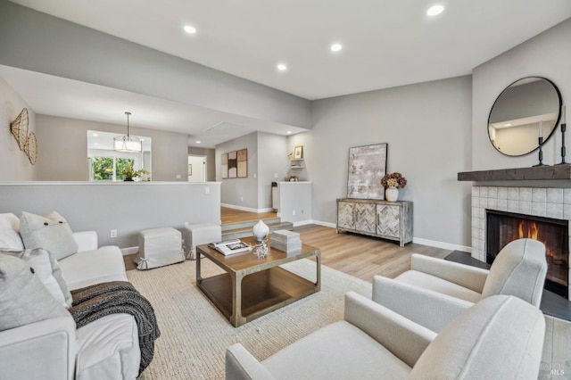 13 Freedom Ln S, Petaluma, CA 94952 - living area with wood finished floors, baseboards, recessed lighting, and a fireplace