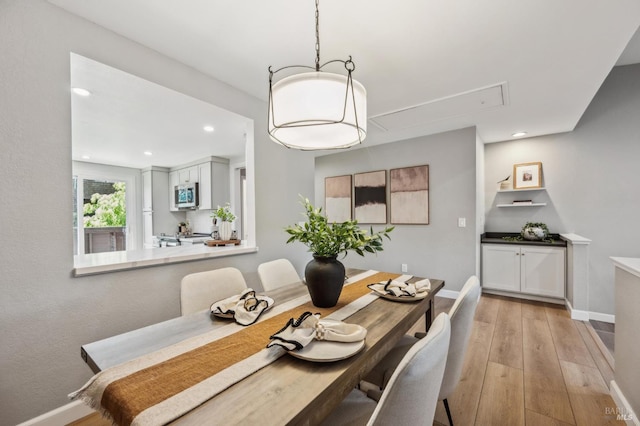 13 Freedom Ln S, Petaluma, CA 94952 - dining space with attic access, light wood-style floors, recessed lighting, and baseboards