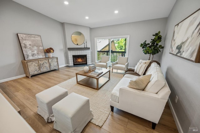 13 Freedom Ln S, Petaluma, CA 94952 - living room featuring wood finished floors, recessed lighting, baseboards, and a fireplace