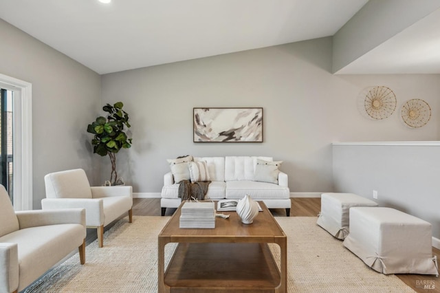 13 Freedom Ln S, Petaluma, CA 94952 - living area featuring lofted ceiling, wood finished floors, and baseboards