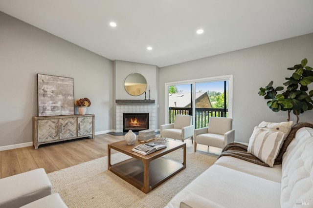 13 Freedom Ln S, Petaluma, CA 94952 - living room with baseboards, light wood finished floors, recessed lighting, and a fireplace