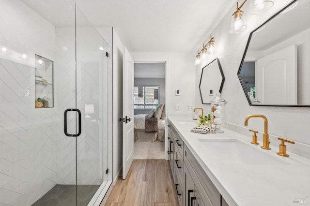 13 Freedom Ln S, Petaluma, CA 94952 - ensuite bathroom with double vanity, a shower stall, and wood finished floors