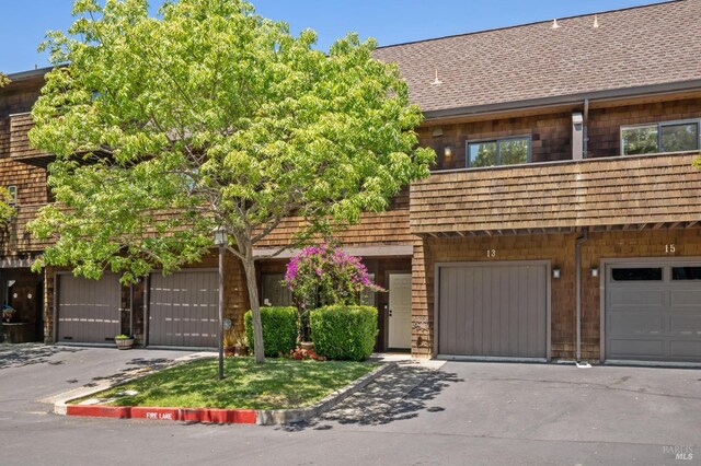13 Freedom Ln S, Petaluma, CA 94952 - multi unit property with roof with shingles, driveway, and an attached garage