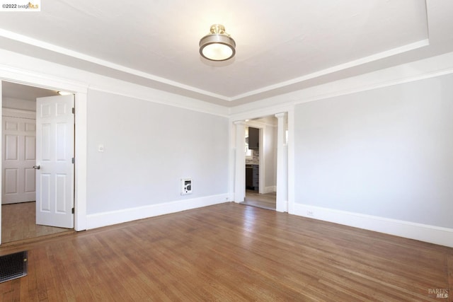 5817 Seminary Ct, Oakland, CA 94605 - spare room featuring baseboards, a raised ceiling, wood finished floors, and heating unit