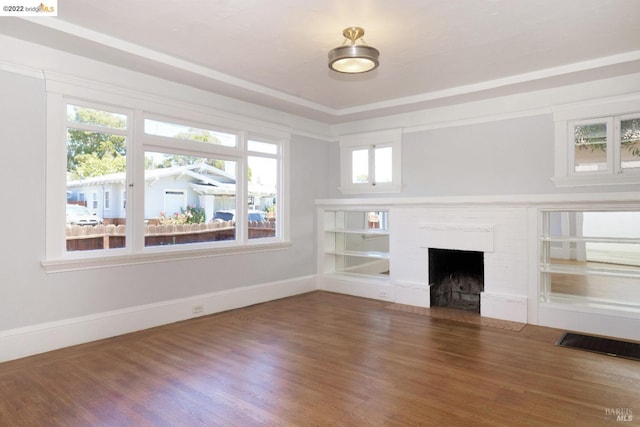 5817 Seminary Ct, Oakland, CA 94605 - unfurnished living room featuring wood finished floors, baseboards, and a fireplace with flush hearth
