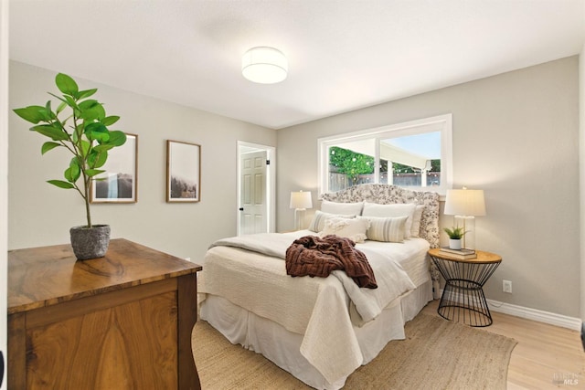809 Paula Ln, Petaluma, CA 94952 - bedroom with baseboards and light wood-type flooring