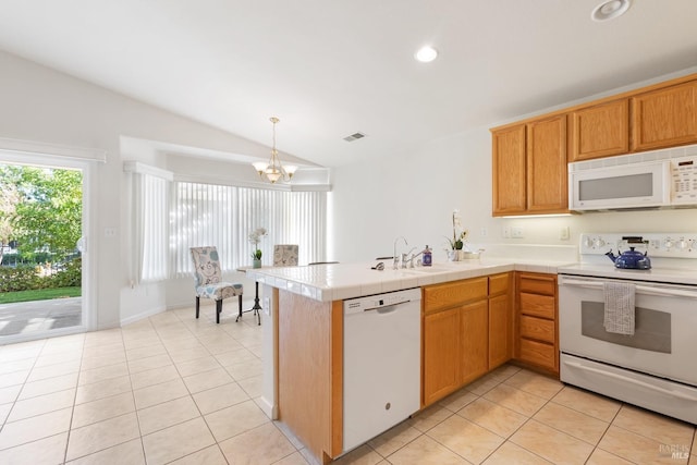 280 Foxwood Ln, Rio Vista, CA 94571 - kitchen with white appliances, a sink, light tile patterned flooring, lofted ceiling, and a chandelier