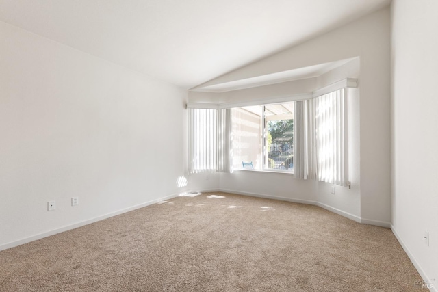 280 Foxwood Ln, Rio Vista, CA 94571 - unfurnished room featuring carpet flooring, lofted ceiling, and baseboards