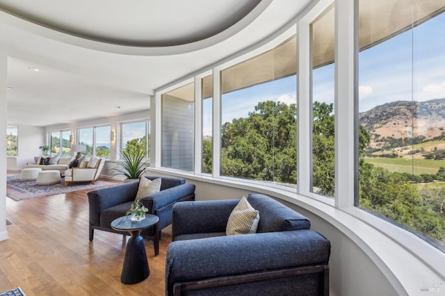 5768 Silverado Trl, Napa, CA 94558 - sunroom featuring wood finished floors, a mountain view, and recessed lighting