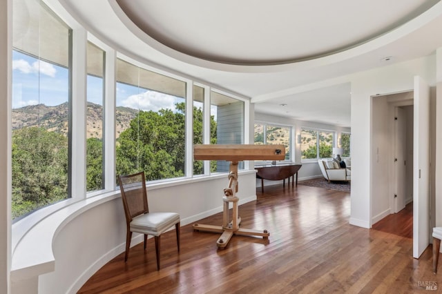 5768 Silverado Trl, Napa, CA 94558 - sitting room with healthy amount of natural light, baseboards, a mountain view, and wood finished floors