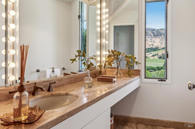 5768 Silverado Trl, Napa, CA 94558 - bathroom featuring double vanity and baseboards