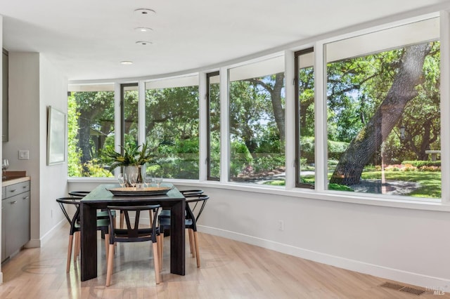 5768 Silverado Trl, Napa, CA 94558 - dining area with baseboards and light wood-type flooring