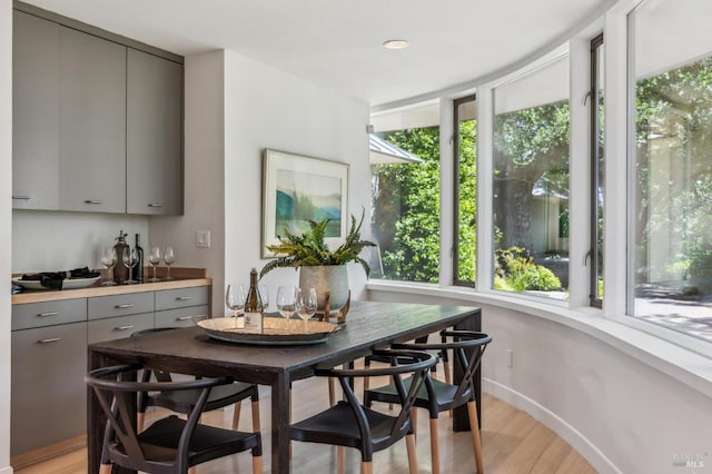5768 Silverado Trl, Napa, CA 94558 - dining area with a bar and light wood-style floors