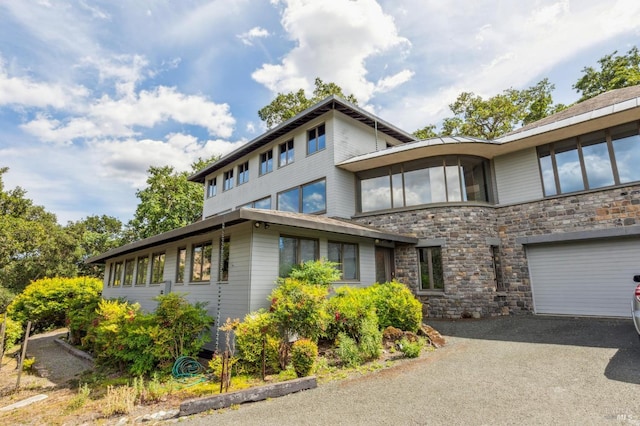 5768 Silverado Trl, Napa, CA 94558 - view of front of home featuring stone siding and driveway