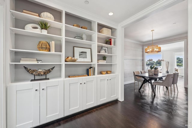 616 Locust St, Sausalito, CA 94965 - dining area featuring ornamental molding, dark wood-style floors, a chandelier, built in features, and baseboards
